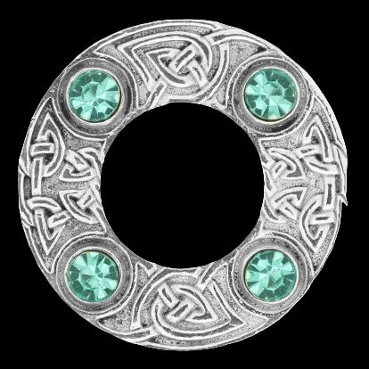 Decorative ring with Celtic knot design and green gemstones on a white background