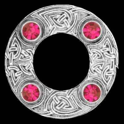 Decorative circular piece with Celtic knot patterns and pink gemstones on a white background